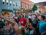 Crowd dances while Big Sam’s Funky Nation performs at the Boogie on the Bricks